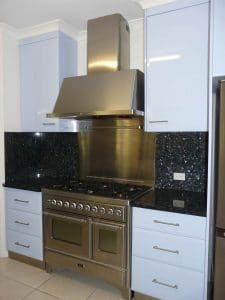 Custom kitchen cabinetry with stove