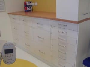 A custom cabinet with drawers in a medical office