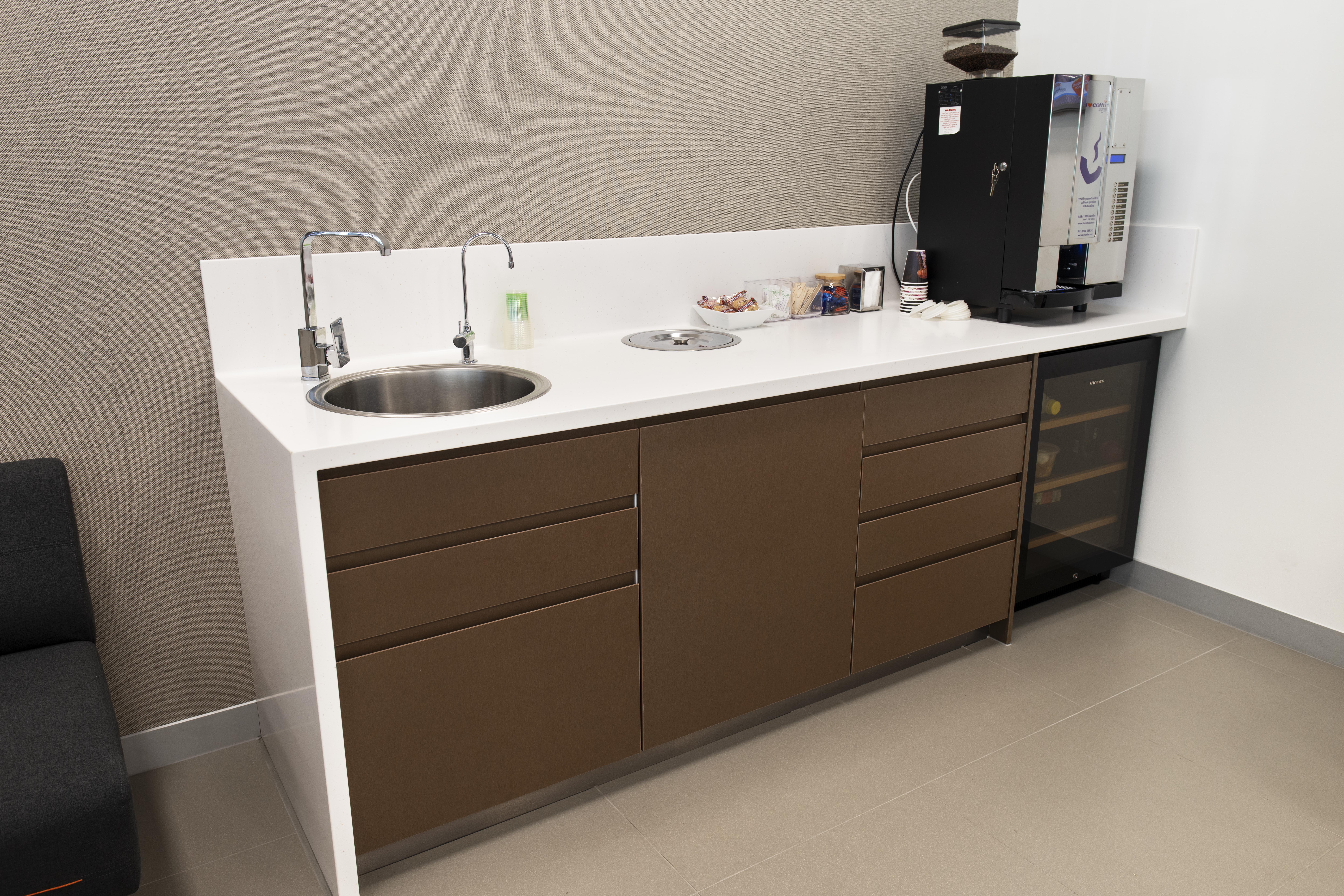 A custom kitchenette installed in an office