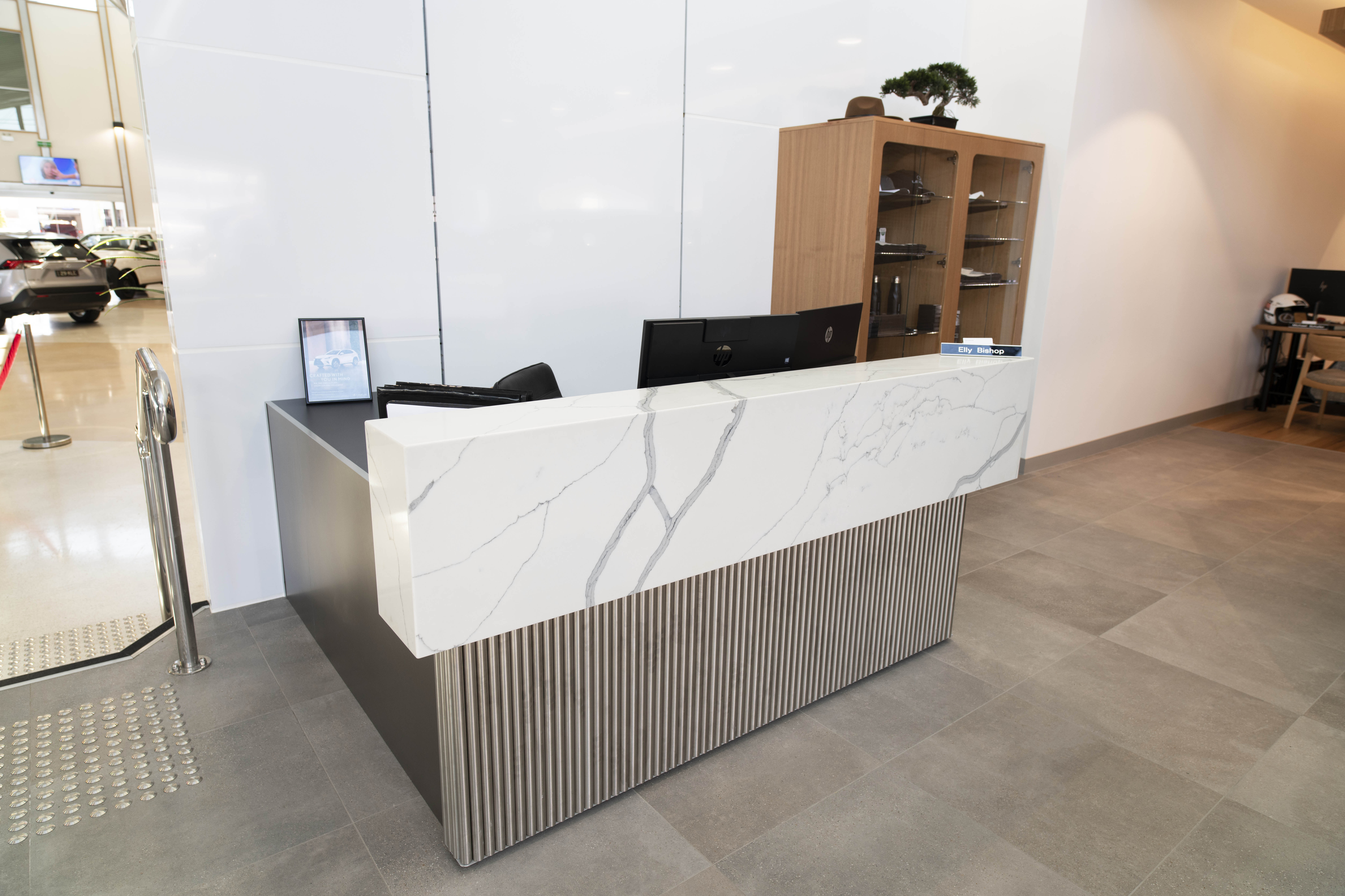 A marble custom reception desk in an office in Rockhampton