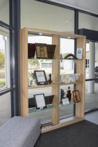 Custom display cabinet installed in a reception room