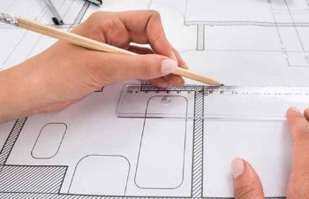 Cabinet maker measuring and drafting kitchen design plans - kitchen designs Rockhampton, QLD
